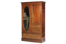An Edwardian mahogany compactum wardrobe with fine inlaid decoration.