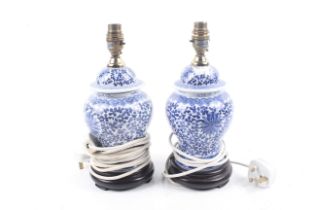 Pair of oriential blue and white china table lamps.