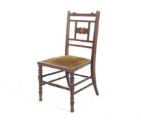 A Sheraton Revival Edwardian mahogany child's chair.