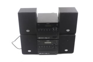 Two BUSH DAB radio CD micro hi-fi systems with speakers.