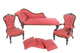 A Victorian matched upholstered suite of a mahogany show wood chaise longue and two salon chairs.