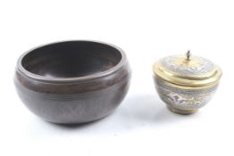 Two metal Islamic bowls.