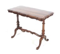 A Victorian rosewood occasional table.