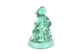 A late 19th century moulded green glass figure of 'Punch and Toby' by John Derbyshire, Manchester.
