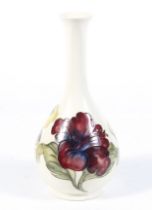 A 19th century Moorcroft Hibiscus pattern pottery vase.