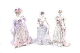 Three Coalport 'Femmes Fatales' ceramic figures.