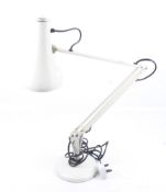 A mid-century Herbert Terry anglepoise desk lamp. Model 90, cream, with circular weighted base.