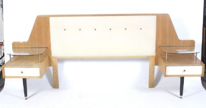 A vintage mid-century E Gomme G-Plan retro oak double bed headboard.