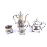 A Middle Eastern silver plated and brass four piece tea and coffee service.