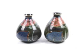 A pair of Roger Dean Art Nouveau vases.