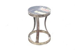 A handmade vintage industrial style riveted metal stool /table.