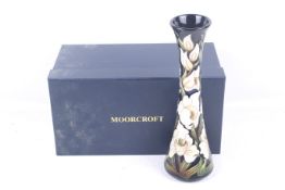A Moorcroft Pottery tube lined trumpet form vase.