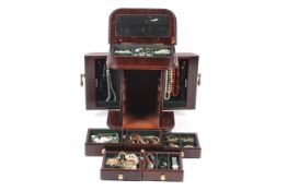 A mahogany jewellery chest and contents.