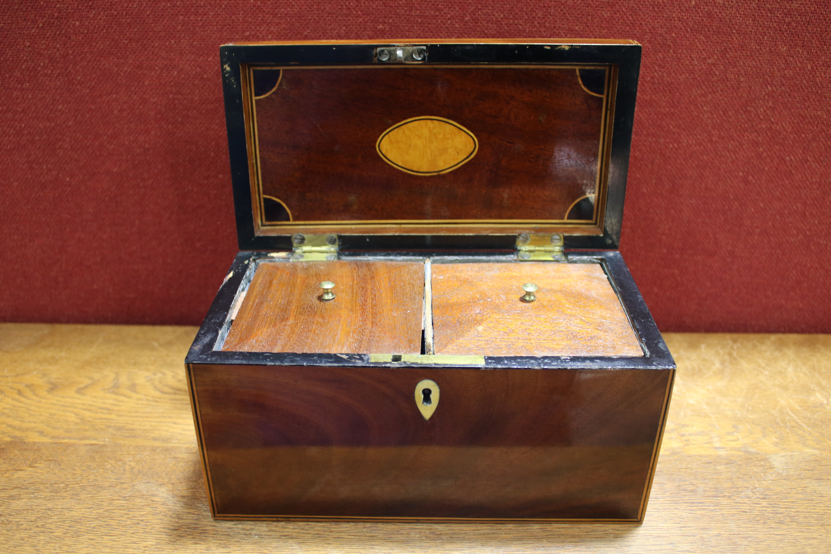 A 19th century mahogany veneered tea caddy. - Image 8 of 10