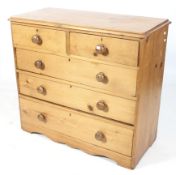 A 20th century pine chest of drawers.