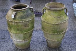 Two garden ornamental stoneware pots with handles. Applied crimped decoration.