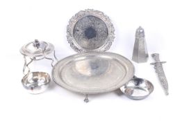 An assortment of silver plated items and a hammered pewter hexagonal caster.