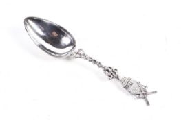 A 19th century Dutch silver christening spoon with a windmill handle.