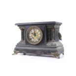 A Victorian black marble effect wooden cased mantel clock.