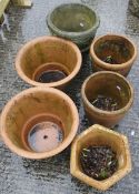 Six garden plant pots.