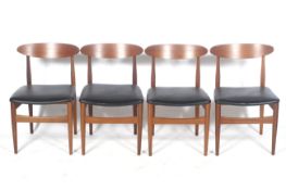 A set of four mid-century Scandinavian style dining chairs.
