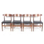 A set of four mid-century Scandinavian style dining chairs.