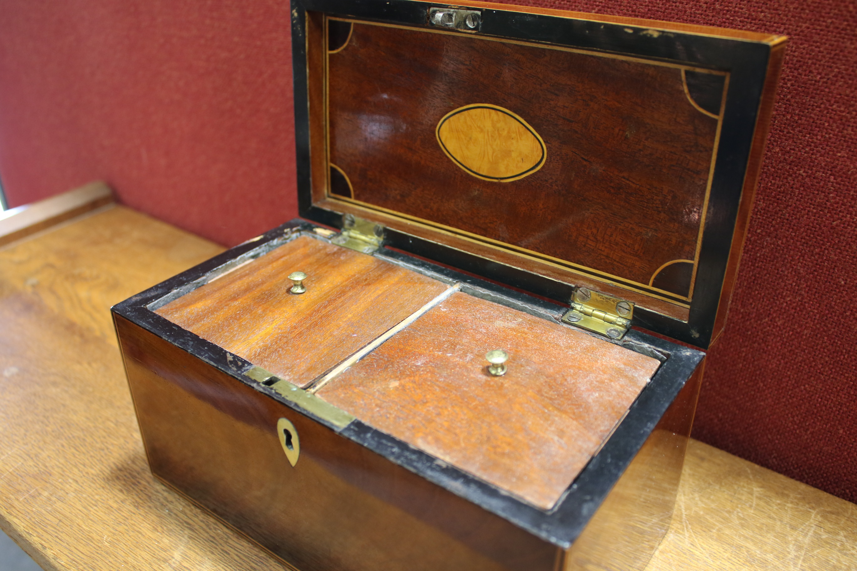 A 19th century mahogany veneered tea caddy. - Image 9 of 10