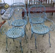 A set of four turquise painted wirework garden chairs.