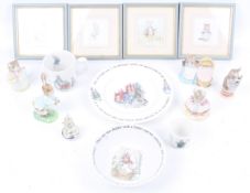An assortment of Beatrix Potter collectables.