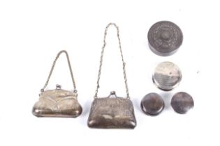 A silver handbag-shaped purse, an EPNS purse and four other small boxes.