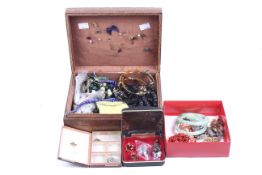 A collection of costume and other jewellery to include a gold-mounted twin-flowerhead brooch.