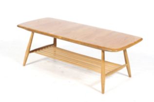 A mid-century Ercol elm and beech coffee table.