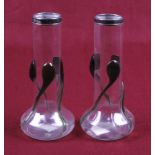 A pair of hallmarked Stirling silver rimmed glass vases.