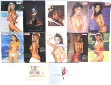 A collection of 1990s glamour model wall calendars.