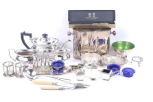 A collection of silver plated items.