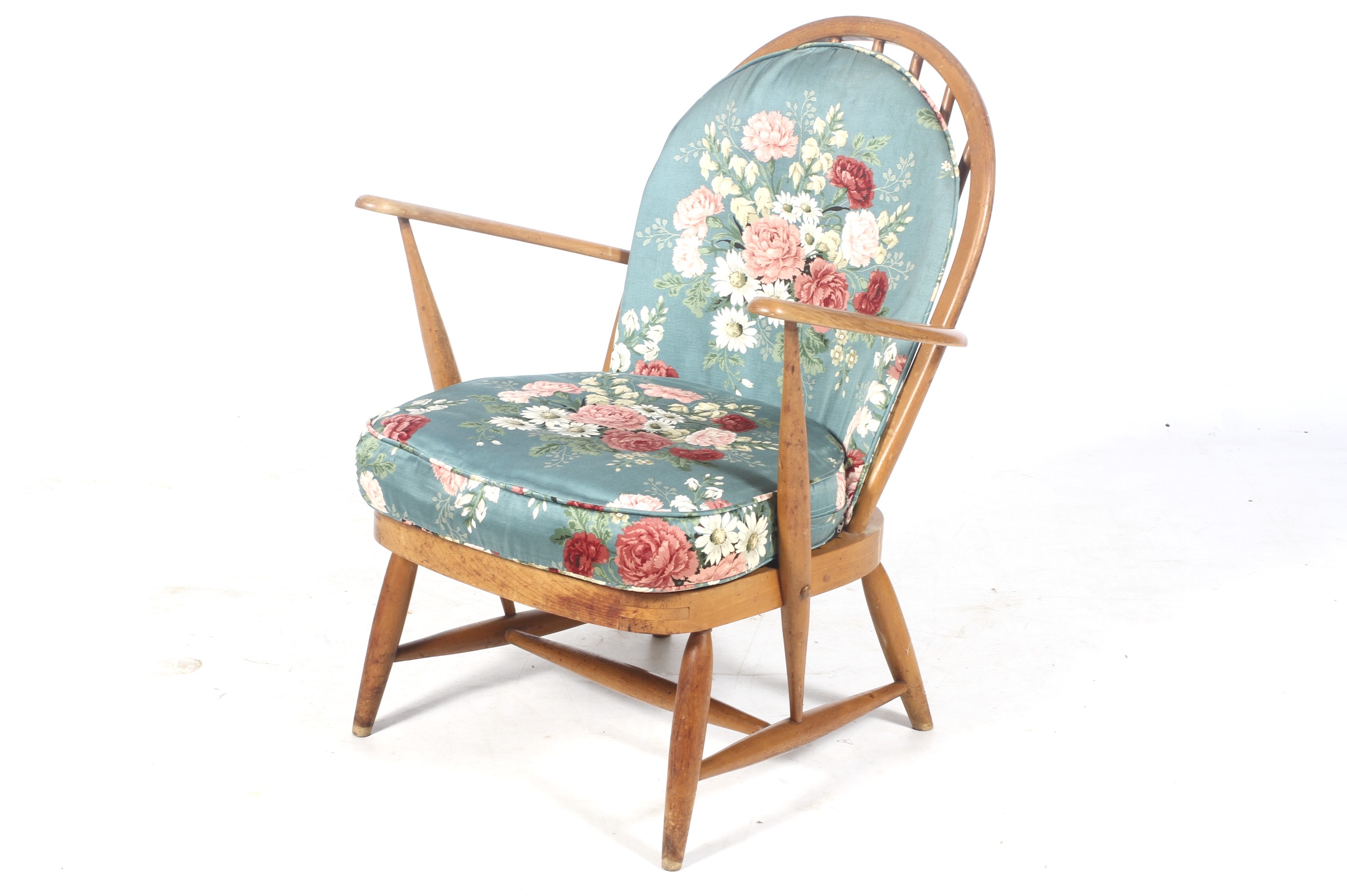 Mid-century Ercol light elm stickback open armchair.