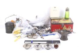 An assortment of silver plate and silver items.