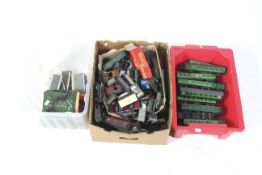 A large collection of assorted OO gauge model railway accessories.