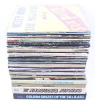 A collection of assorted mostly 1970s and 1980s LP vinyl records.
