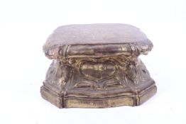 A vintage terracotta plinth base.