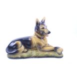 A plaster model of a German Shepherd.