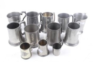 Twelve 19th century and later tankards.