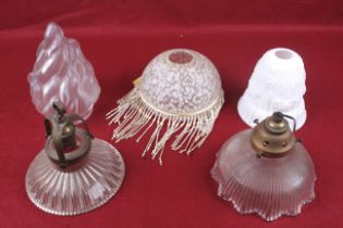 Five vintage glass lamp shades.