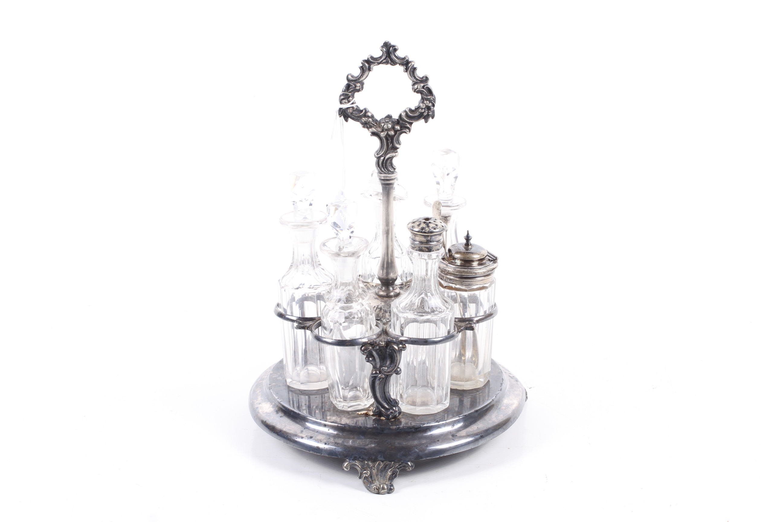 A Victorian seven bottle silver plated cruet stand. Elkington & Co.