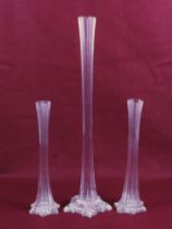 Three Victorian style glass lily vases. A pair and one other. Max.