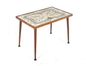 A mid-century 1950s mosaic tile top coffee/occasional table.