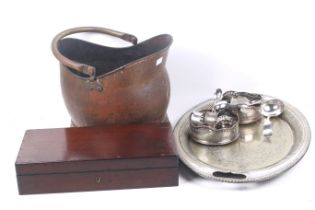 A collection of silver plated items.