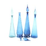 A circa 1970s collection of four Empoli 'genie' bottles.