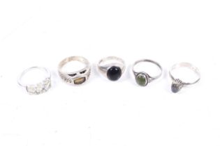 Five gem set rings each stamped '925'.
