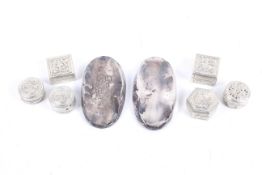 A small collection of silver and white metal. To include two hallmarked silver oval brush mounts.